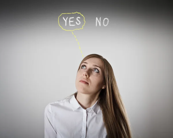 Woman in white is full of doubts and hesitation. — Stock Photo, Image