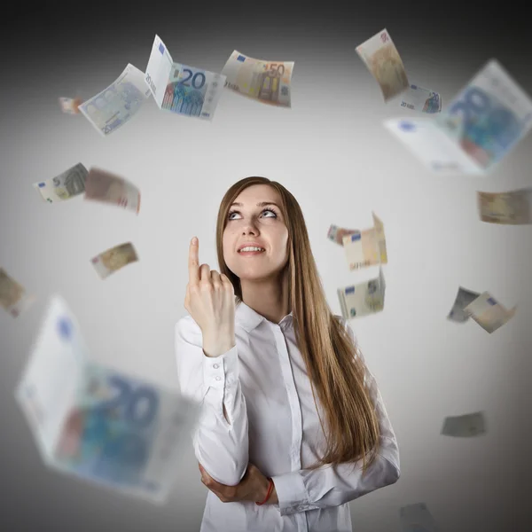 Pointant du doigt. Femme en blanc et Euro . — Photo