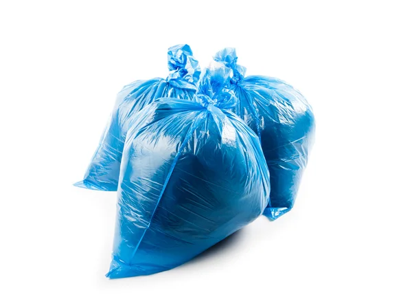 Drie blauwe vuilniszakken — Stockfoto