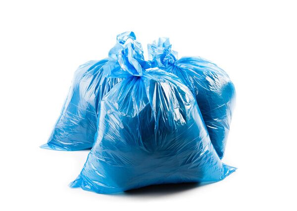 Three blue garbage bags