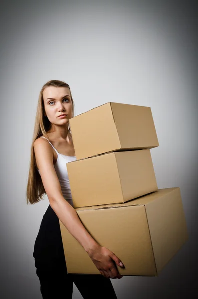 Woman and cardboards. — Stock Photo, Image