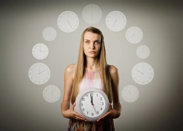 Girl and clock. — Stock Photo, Image