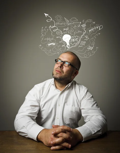 Man in white and ideas. — Stock Photo, Image