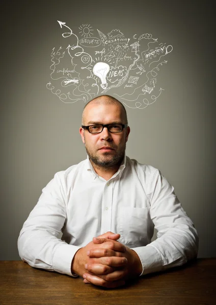 Man in white and ideas. — Stock Photo, Image