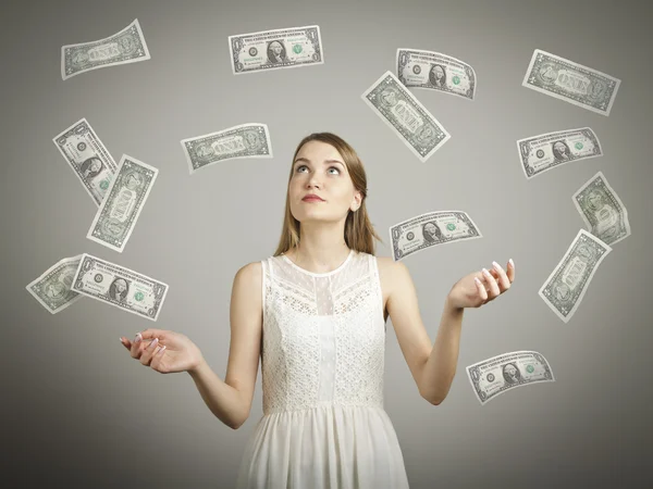 Girl in white and dollars. — Stock Photo, Image