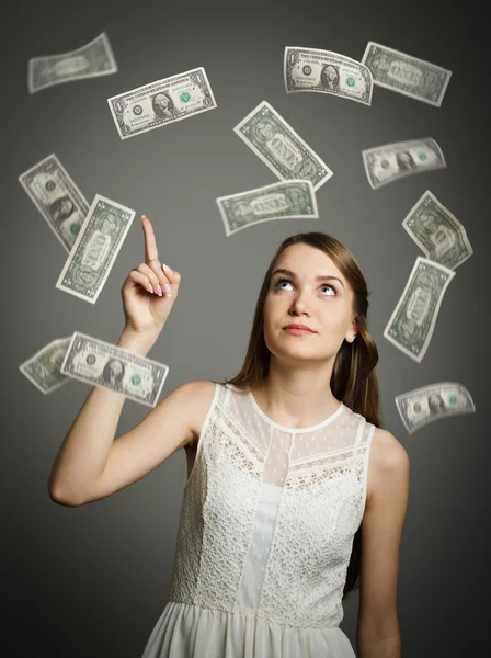 Ragazza in bianco e dollari . — Foto Stock