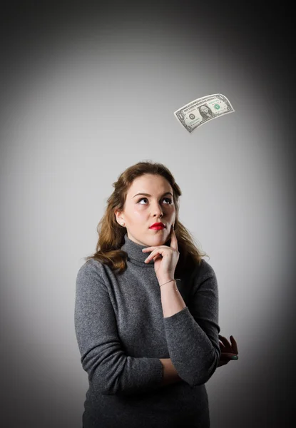 Menina em cinza e um dólar . — Fotografia de Stock