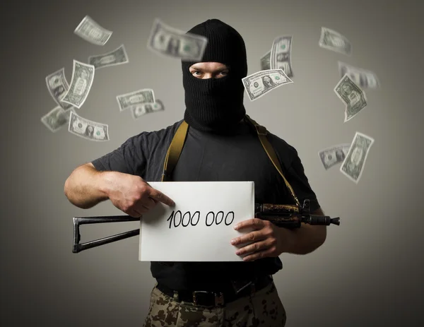 Gewapende gangster en een miljoen dollar. — Stockfoto