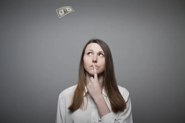 Ragazza in bianco e un dollaro . — Foto Stock