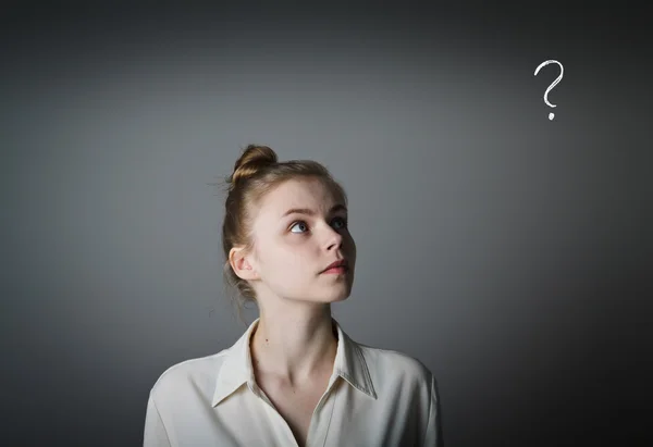 Girl in white and question mark — Stock Photo, Image