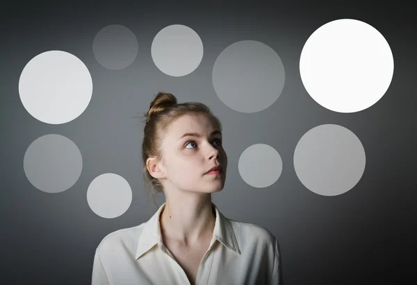 Girl in white and gray bubbles. — Stock Photo, Image