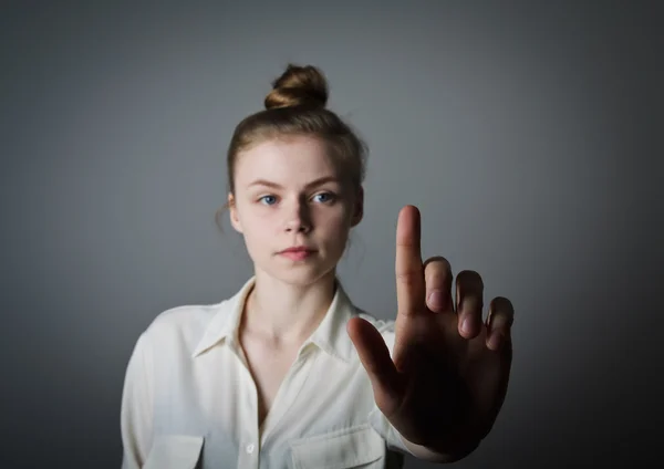 Girl pushing the button — Stock Photo, Image