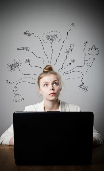 Young woman with laptop. Dreams. — Stock Photo, Image