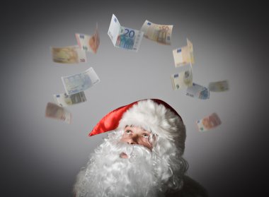 Santa Claus and Euro. clipart