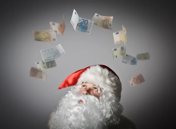 Santa Claus and Euro. — Stock Photo, Image