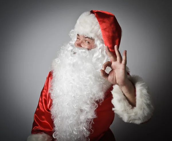 Santa Claus i znak w porządku. — Zdjęcie stockowe