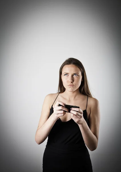 Junge Frau mit Telefon — Stockfoto
