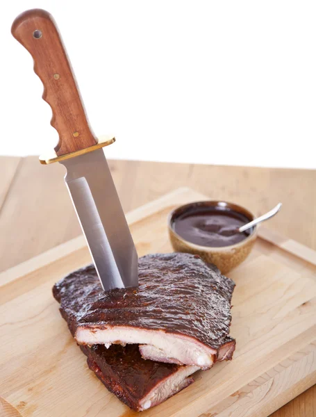 Fresh BBQ ribs on a wooden board — Stock Photo, Image