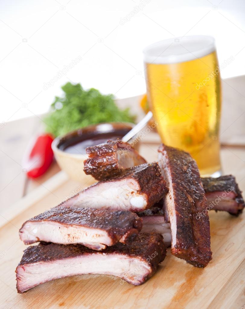 Fresh BBQ ribs on a wooden  board