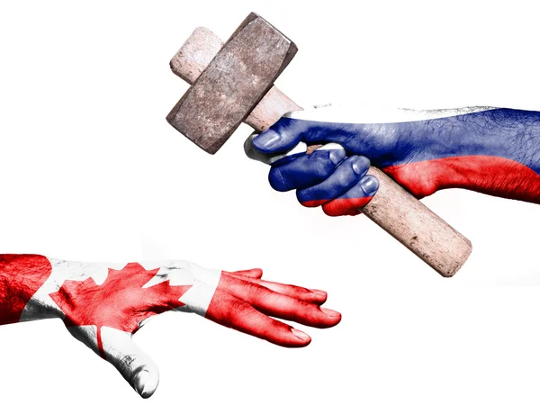 Russia hitting Canada with a heavy hammer — Stock Photo, Image