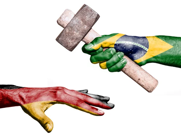 Brazil hitting Germany with a heavy hammer — ストック写真