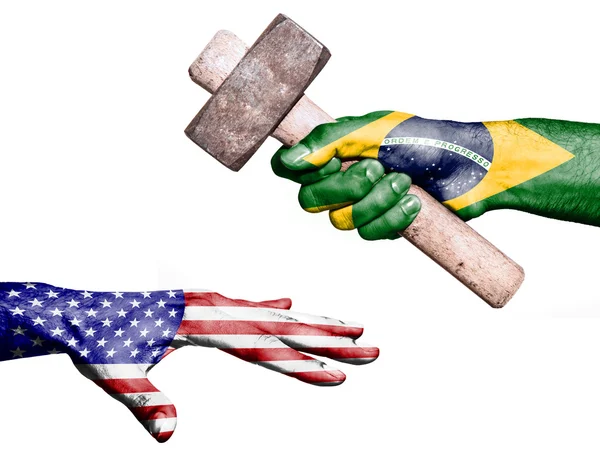 Brazil hitting United States with a heavy hammer — Stok fotoğraf