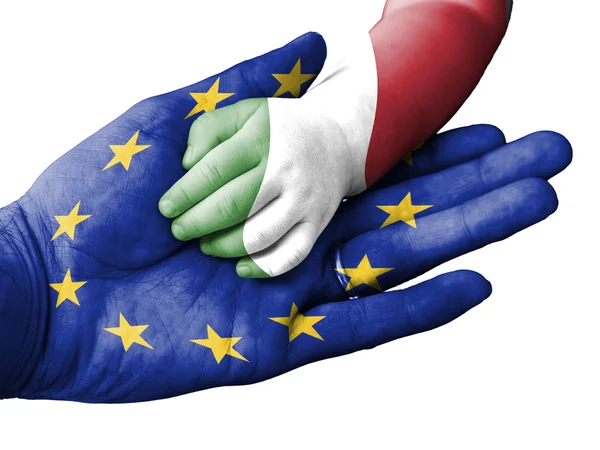 Homem adulto segurando uma mão de bebê com bandeiras da União Europeia e da Itália sobrepostas. Isolado em branco — Fotografia de Stock