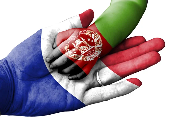 Adult man holding a baby hand with France and Afghanistan flags overlaid. Isolated on white — Stock fotografie