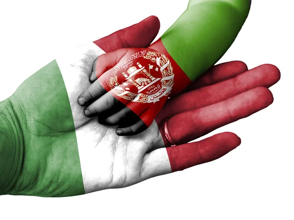 Adult man holding a baby hand with Italy and Afghanistan flags overlaid. Isolated on white — Stock Photo, Image