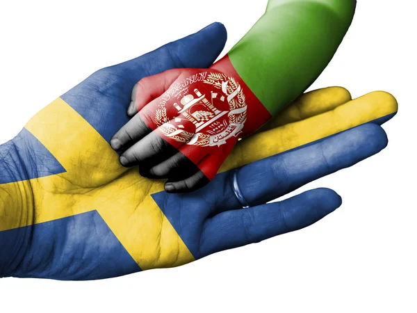 Adult man holding a baby hand with Sweden and Afghanistan flags overlaid. Isolated on white — Stock fotografie
