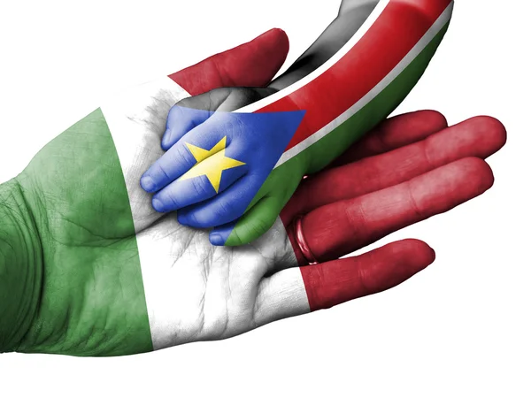 Hombre adulto sosteniendo una mano de bebé con banderas de Italia y Sudán del Sur superpuestas. Aislado sobre blanco —  Fotos de Stock