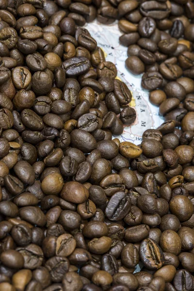 Map of Vietnam under a background of coffee beans — Stockfoto