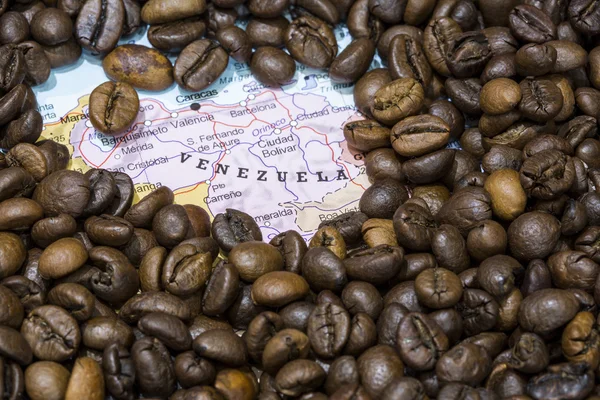 stock image Map of Venezuela under a background of coffee beans