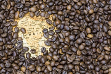 Map of India under a background of coffee beans