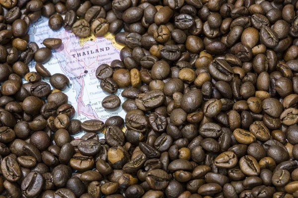 Map of Thailand under a background of coffee beans — Stockfoto