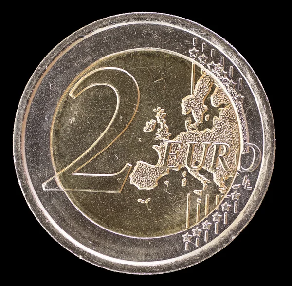 Common side of two euro coin on a black background — Stock Fotó