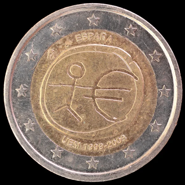Commemorative two euro coin issued by Spain in 2009 for the anniversary of Economic and Monetary Union — стокове фото
