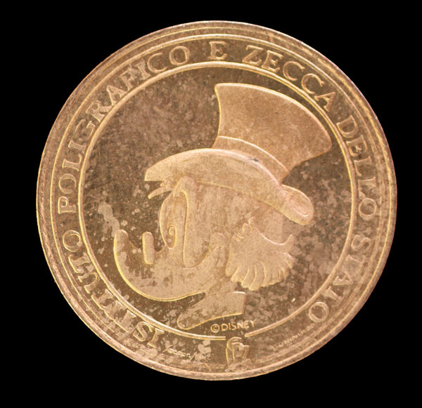 Диснеевская монета с портретом дяди Скруджа Макдака
