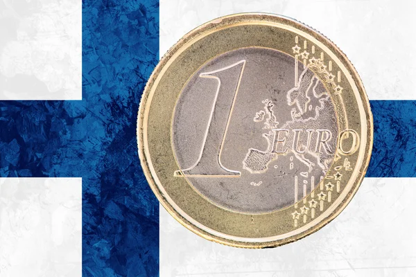 Moneda de un euro en la bandera de Finlandia como fondo —  Fotos de Stock