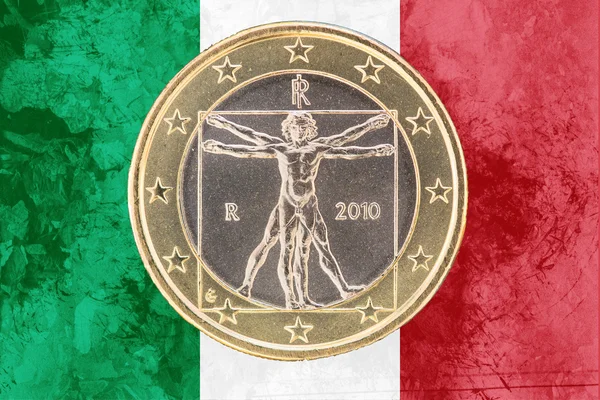 Italian one euro coin on the flag of Italy as background — ストック写真