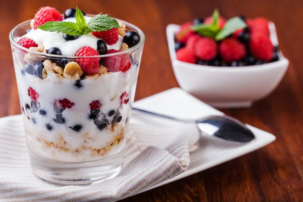 Yogurt with muesli and berries — Stock Photo, Image