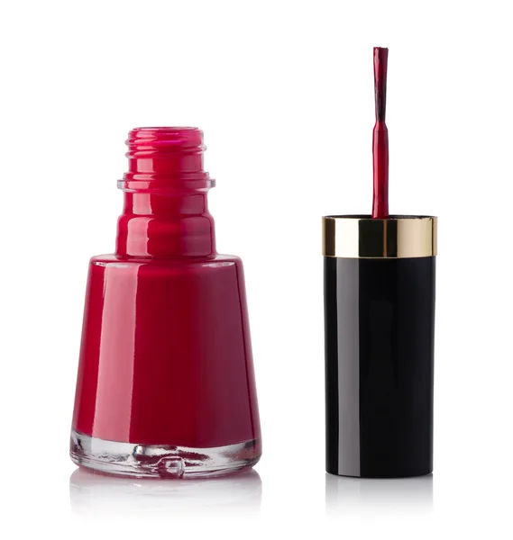 Red nail polish bottle on white background — Stock Photo, Image