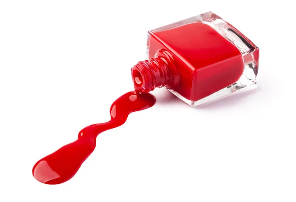 Nail polish flowing from the bottle — Stock Photo, Image