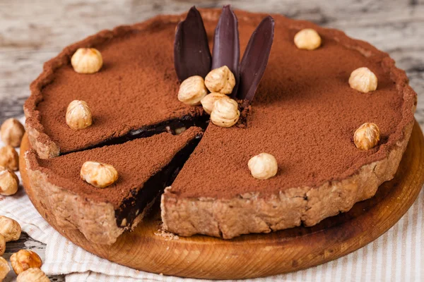 Chocolate tart with hazelnuts — Stock Photo, Image