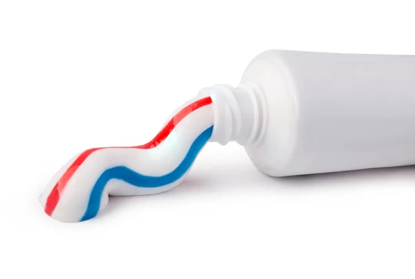 Tubo de pasta de dentes em um fundo branco — Fotografia de Stock