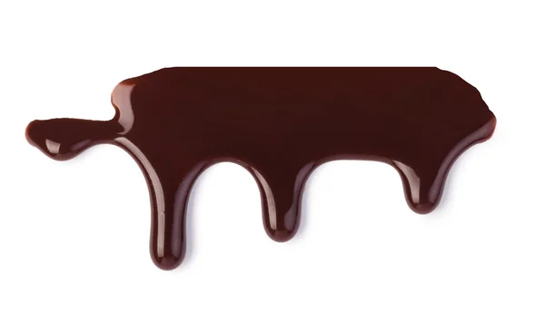 Flussi di cioccolato isolati su un bianco — Foto Stock