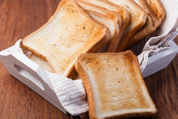 stock image toasted bread, on a wooden