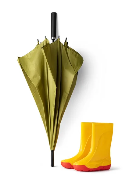 白い背景に緑の傘とガンブーツ — ストック写真