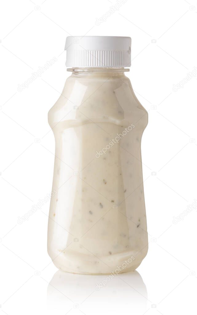 Garlic sauce in a plastic bottle on white background