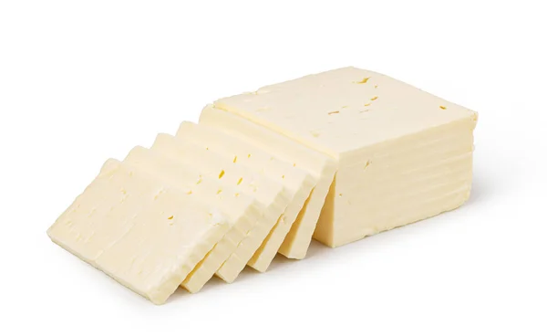 从白色中分离出来的菲塔奶酪 — 图库照片